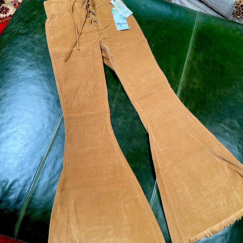 Show me your mumu 
Tan corduroy lace up flare pants